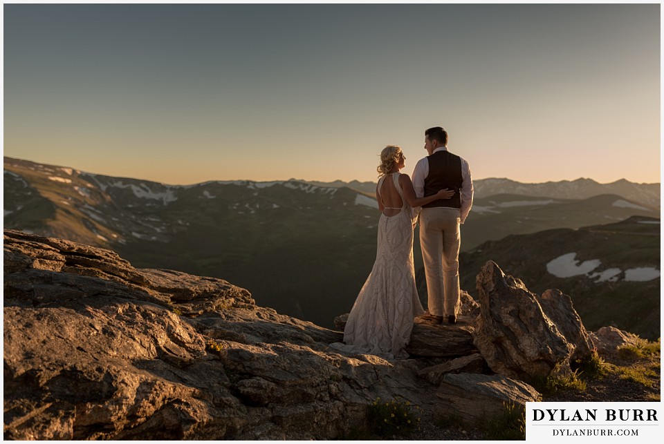 rocky mountain national park wedding elopement bride and groom high in the mountains with snow caps
