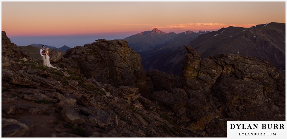 rocky mountain national park wedding elopement bride and groom panoramic view at sunset longs peak in distance