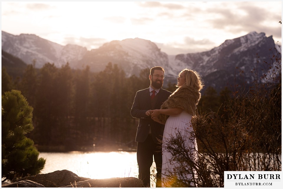 rocky mountain national park wedding elopement bride and groom at sunset at sprague lake