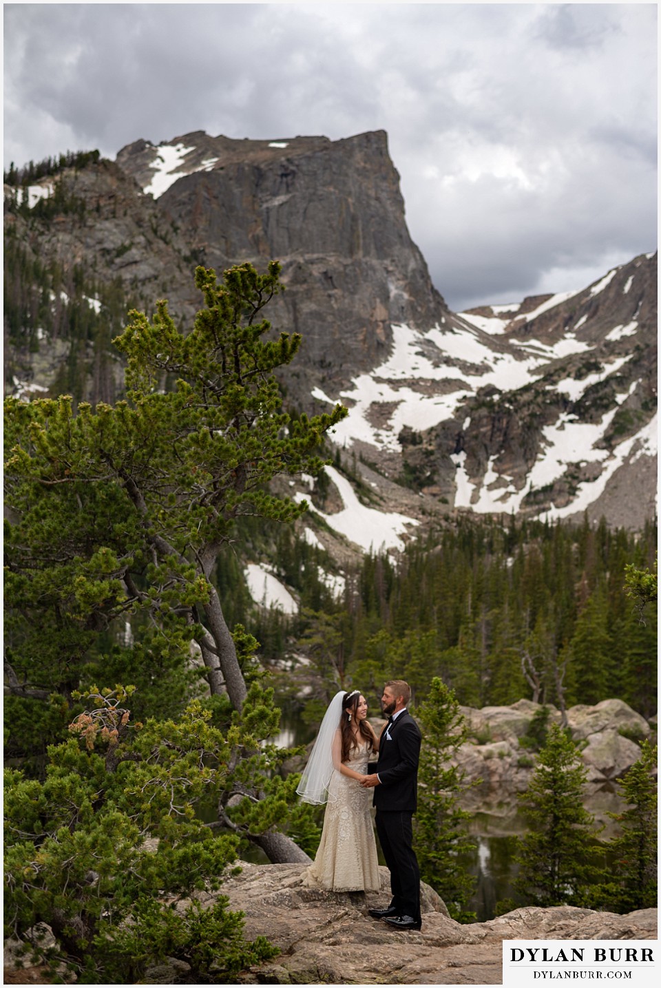 rocky mountain national park wedding elopement colorado wedding photographer dylan burr bride and groom at dream lake and hallet peak