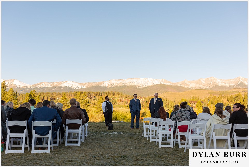 sunrise wedding ceremony site with mountains in the background