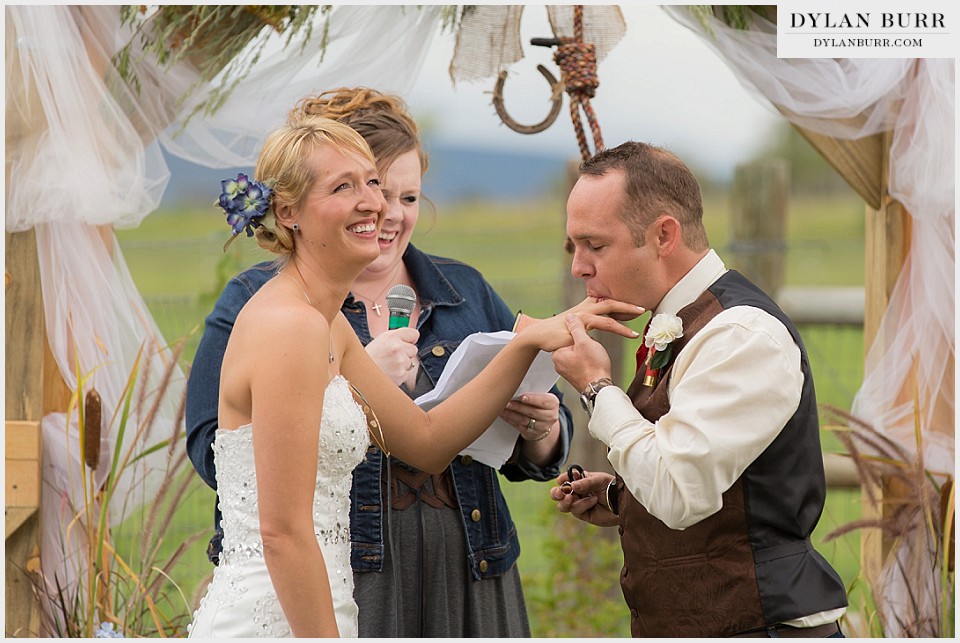 rustic outdoor colorado wedding licking brides finger montrose co