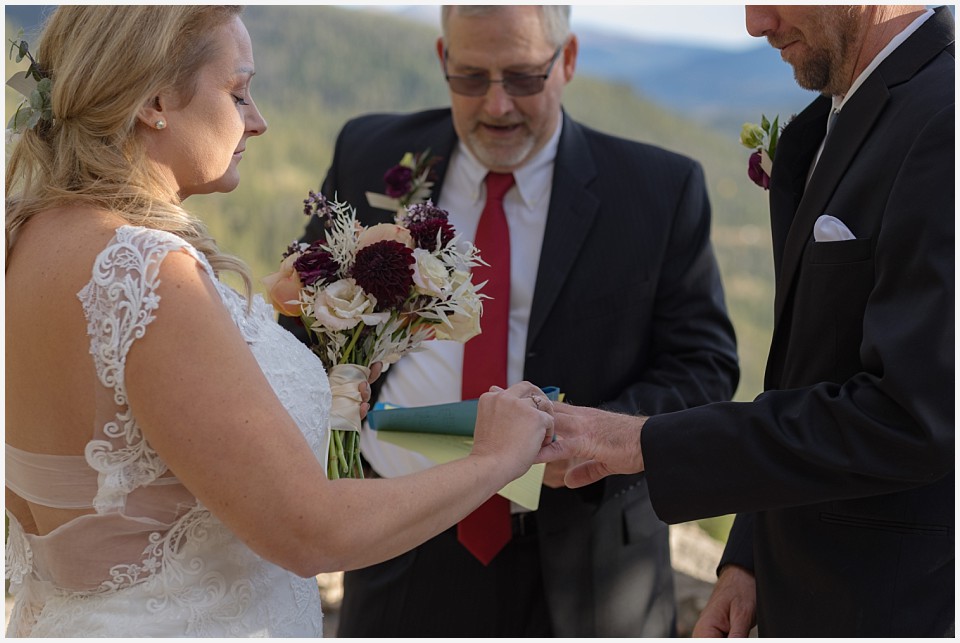 silverthorne elopement wedding exchanging wedding rings