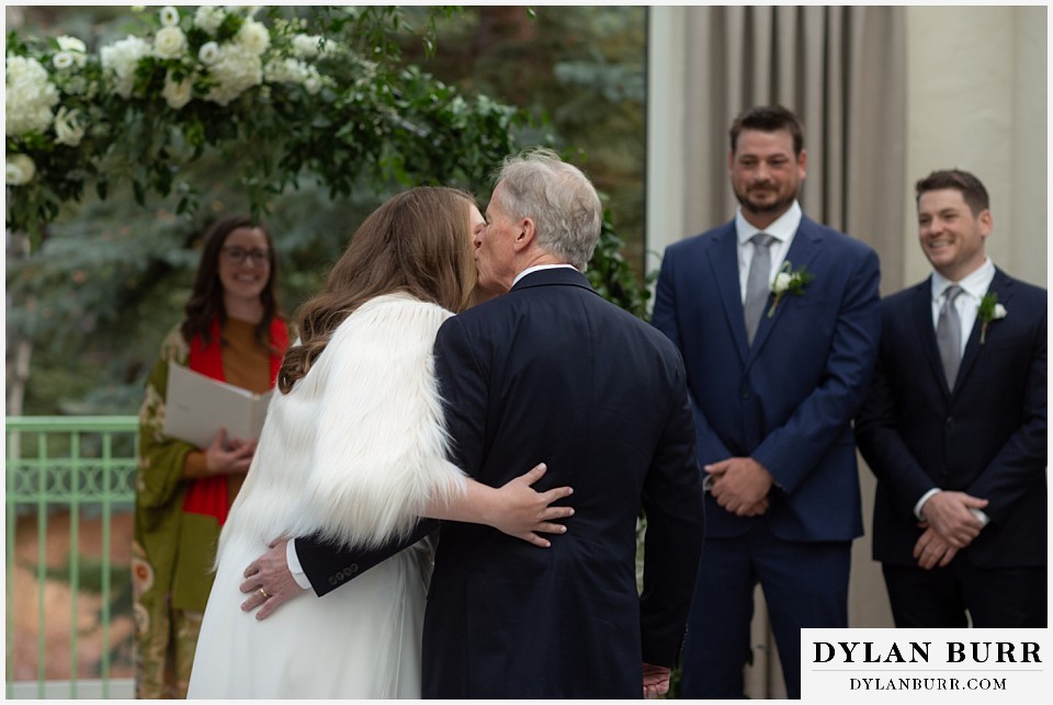 sonnenalp vail wedding brides dad kissing daughter