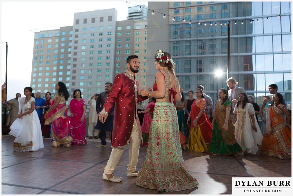 hyatt regency downtown denver indian wedding garba bride and groom together