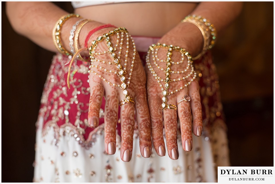 spruce mountain ranch wedding indian wedding henna hands and bangles and jewlery