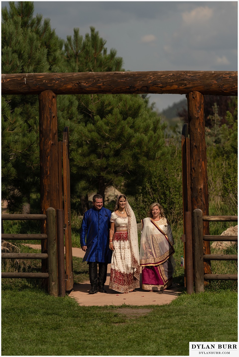 spruce mountain ranch wedding indian wedding bride and family enter wedding ceremony