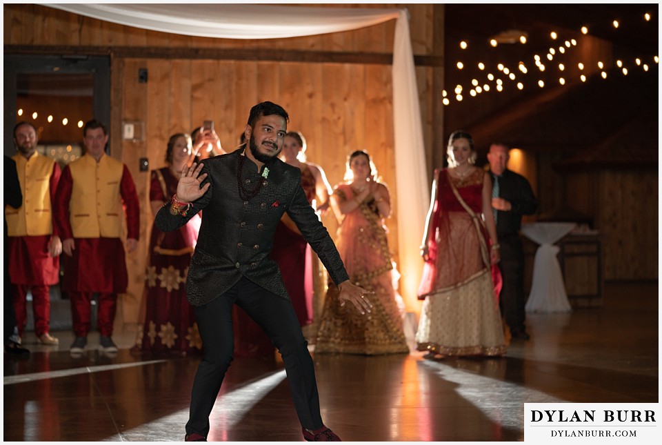 spruce mountain ranch wedding indian wedding groom making dance moves