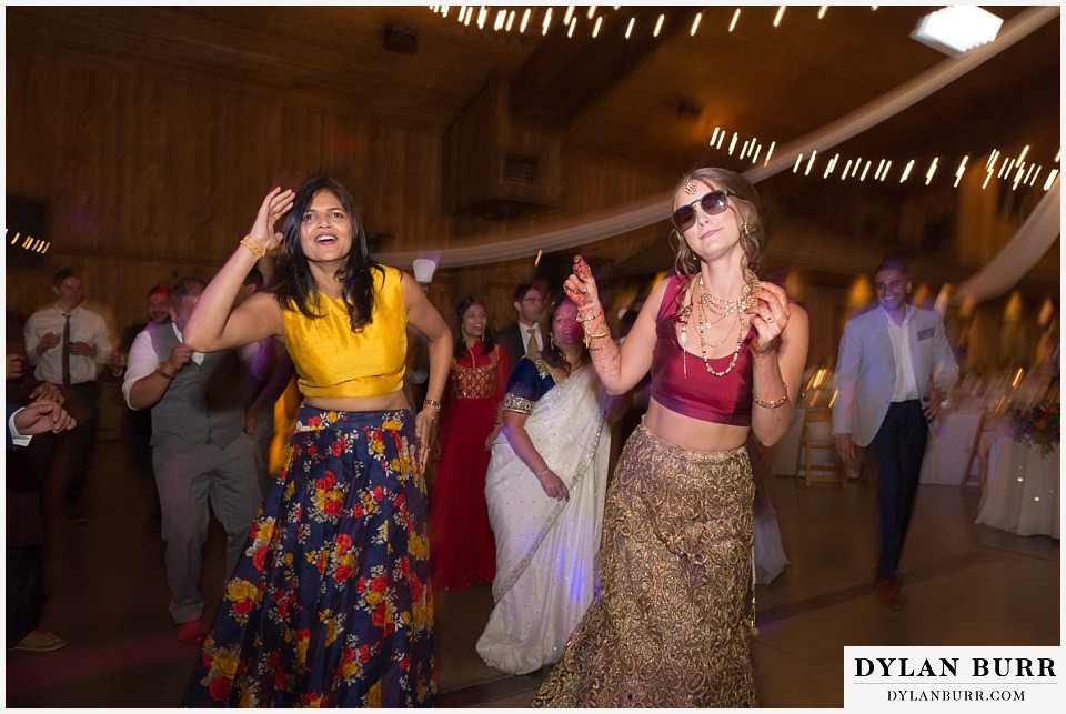 spruce mountain ranch wedding indian wedding bride dancing with sunglasses