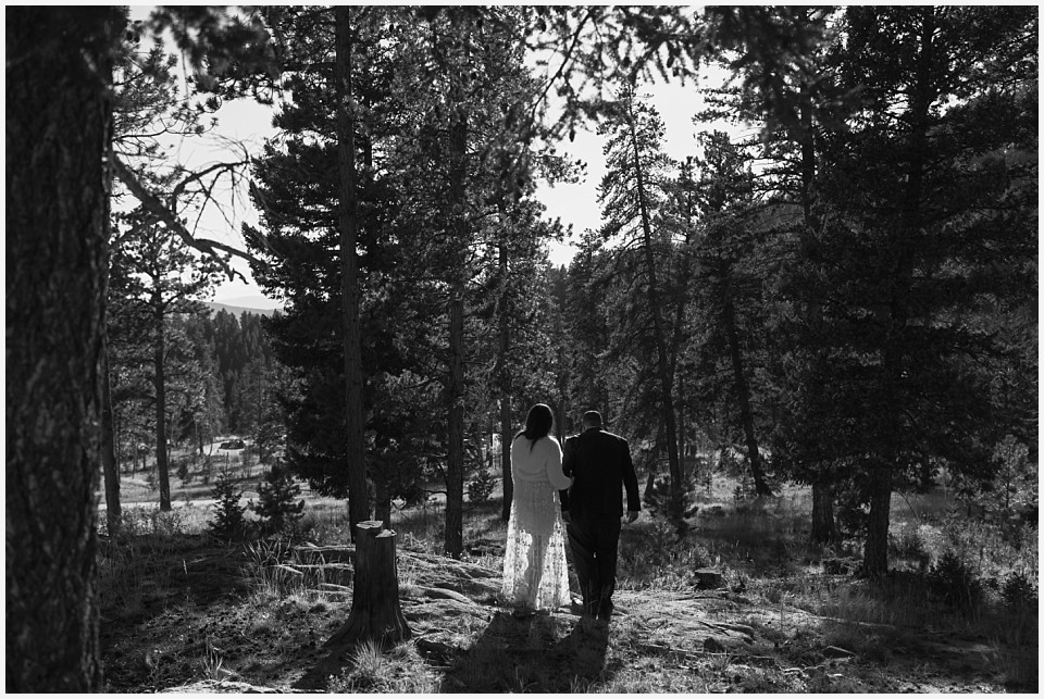 staunton state park colorado elopement wedding black and white image of couple standing in pine trees