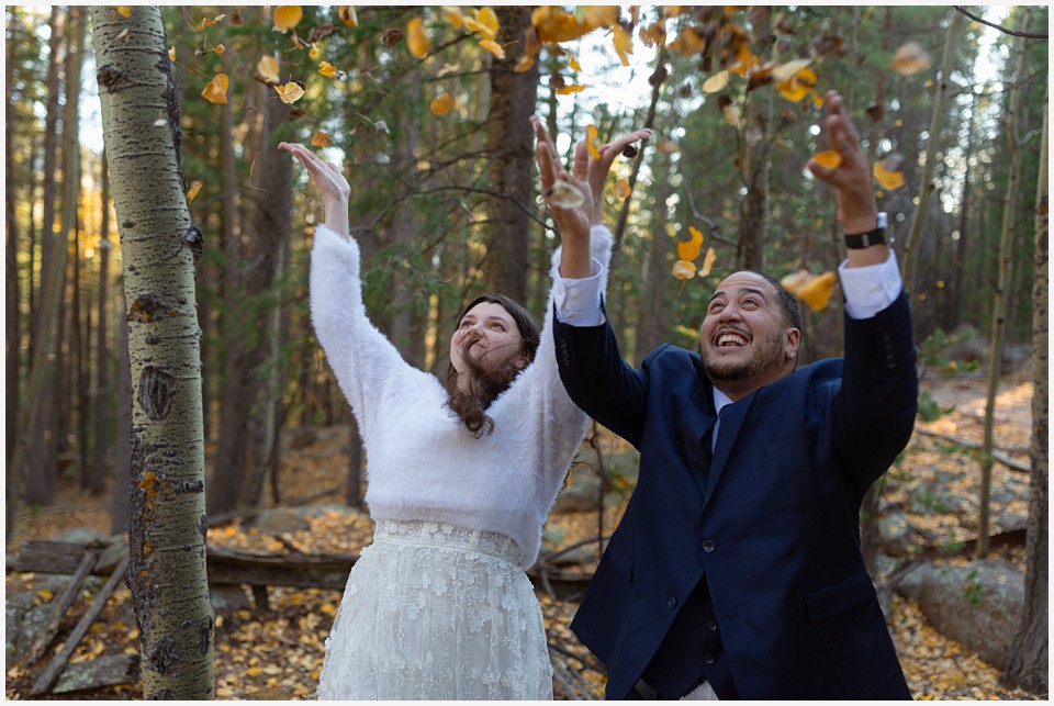 staunton state park colorado elopement wedding throwing aspen leaves