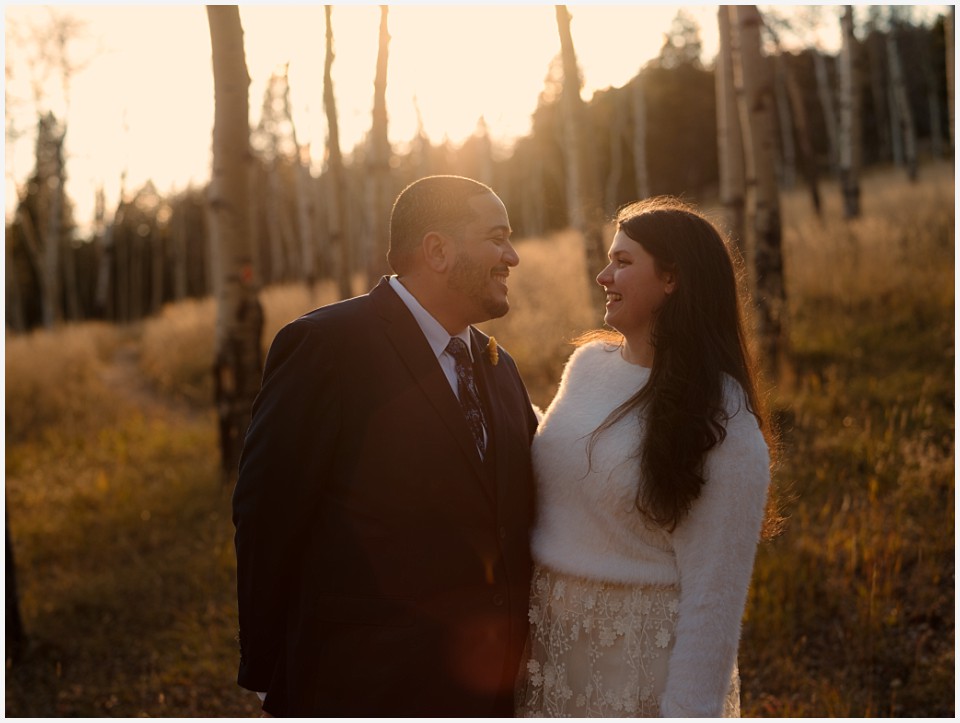 staunton state park colorado elopement wedding laughing together at sunset
