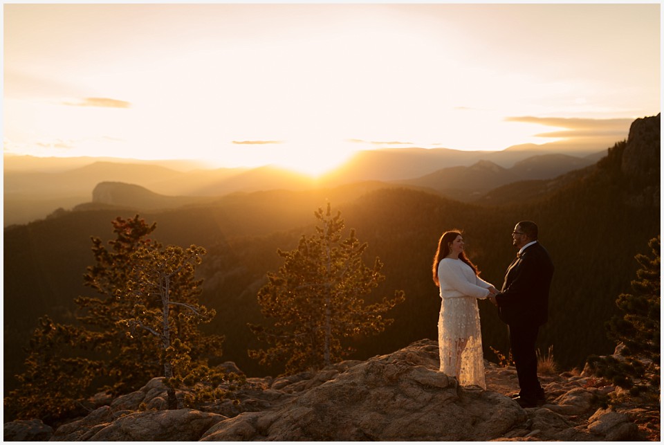 staunton state park colorado elopement wedding couple on mountaintop at sunset