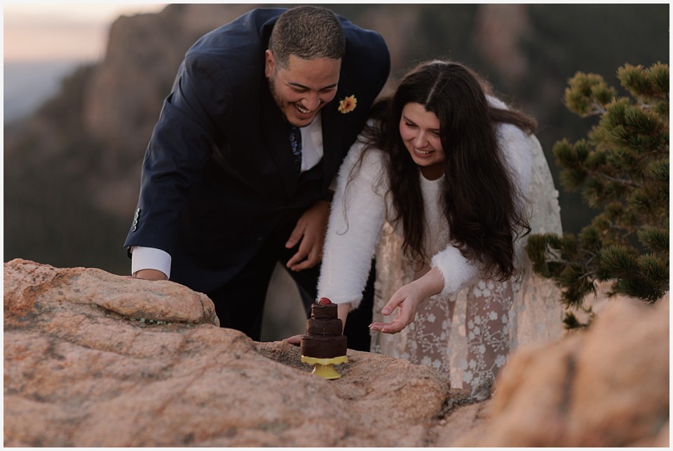 staunton state park colorado elopement wedding cutting the cake together