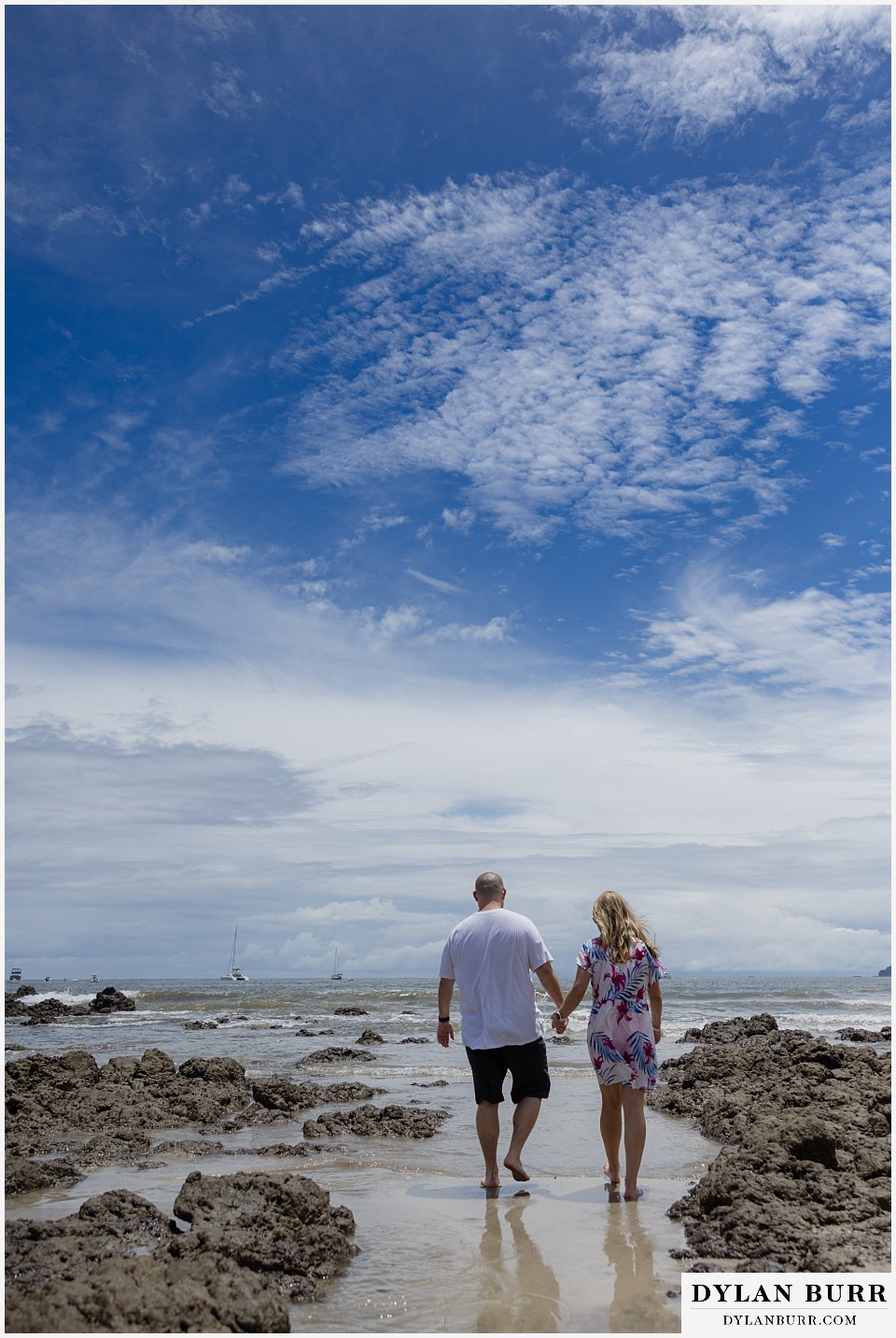 tamarindo beach costa rica photo session walking between rocks