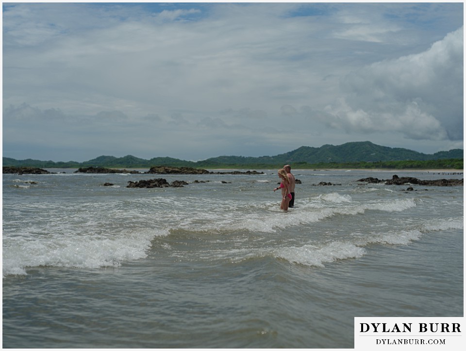 tamarindo beach costa rica photo session playing in waves