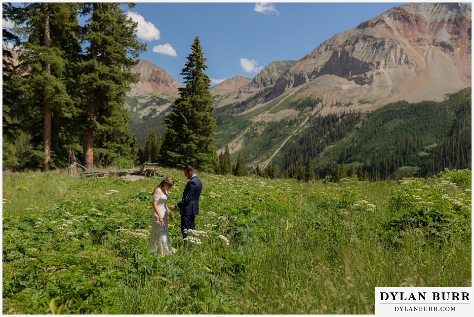telluride colorado elopement wedding adventure bride and groom first look looking at each other