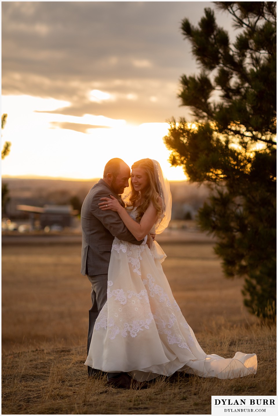 villa parker wedding parker colorado bride and groom snuggling in close at sunset