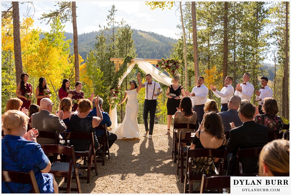 winter park mountain lodge wedding colorado happy newlyweds at wedding ceremony