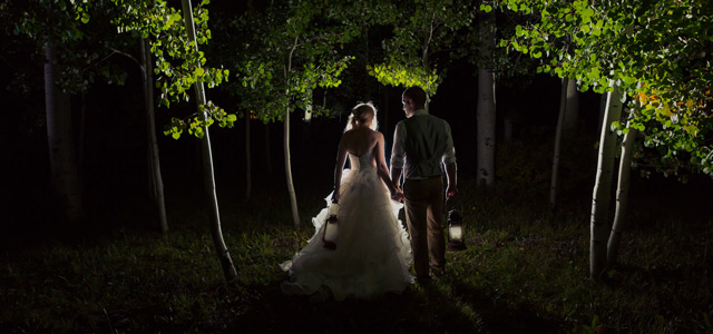 wedding-couple-lanterns-night-aspen-trees